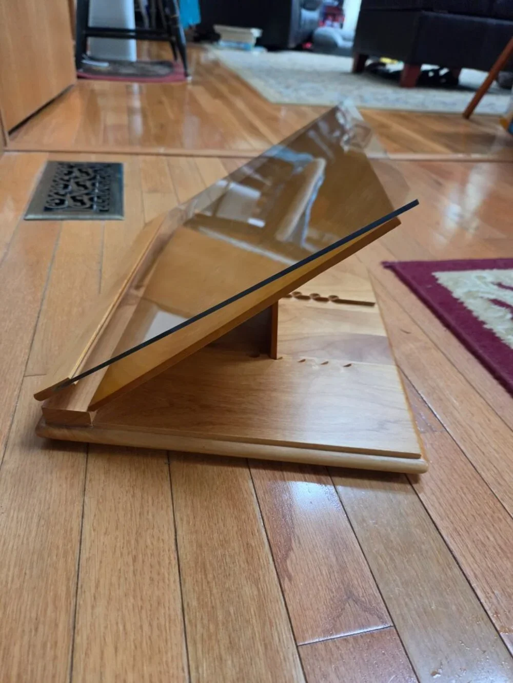 wooden cookbook stand with adjustable slant and an acrylic glass viewing shield